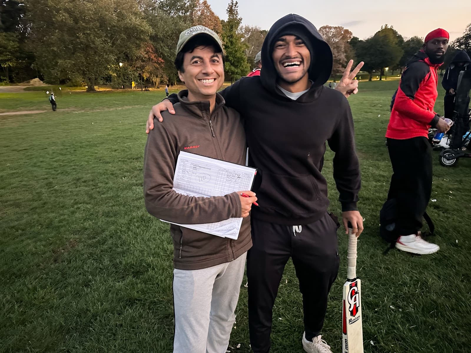 The star batsman (Vic) and his captain after a cricket win. At Prospect Park, Nov’23.